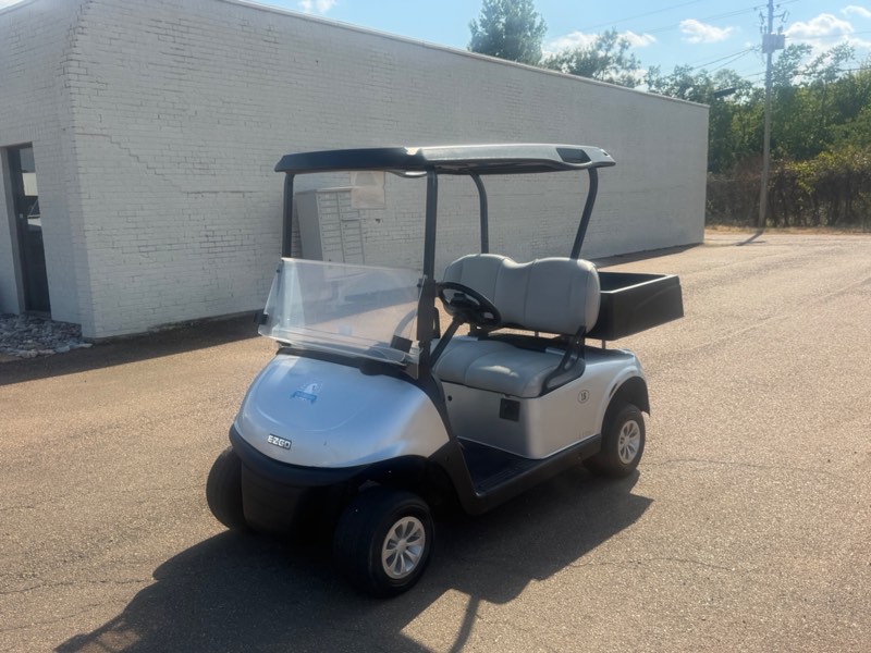 2021 E-Z-GO RXV Elite in silver with black top and rear utility cargo bed, for sale at Jane's Golf Carts in Pearl, MS