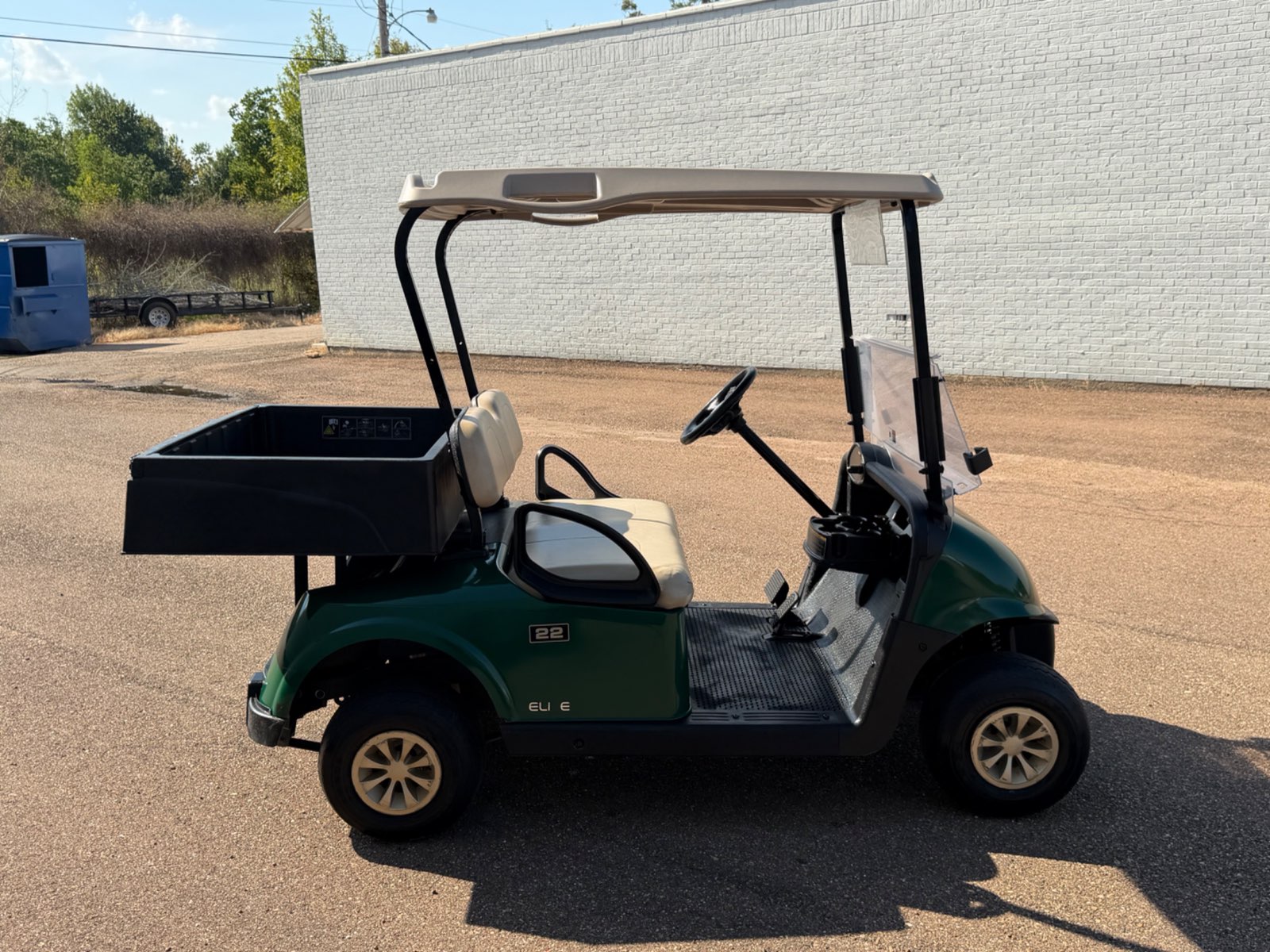 2021 E-Z-GO RXV Elite Electric Golf Cart - Green with Utility Bed - Samsung Lithium Battery - side - Jane's Golf Carts Pearl MS