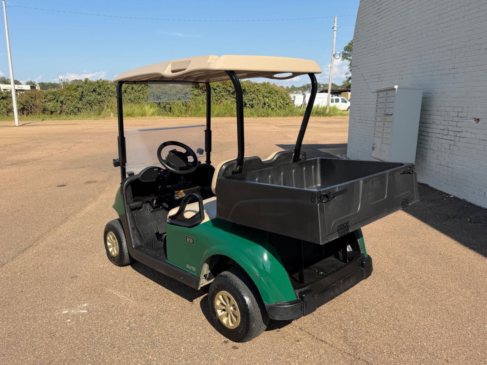2021 E-Z-GO RXV Elite Electric Golf Cart - Green with Utility Bed - Samsung Lithium Battery - rear angle, driver side - Jane's Golf Carts Pearl MS