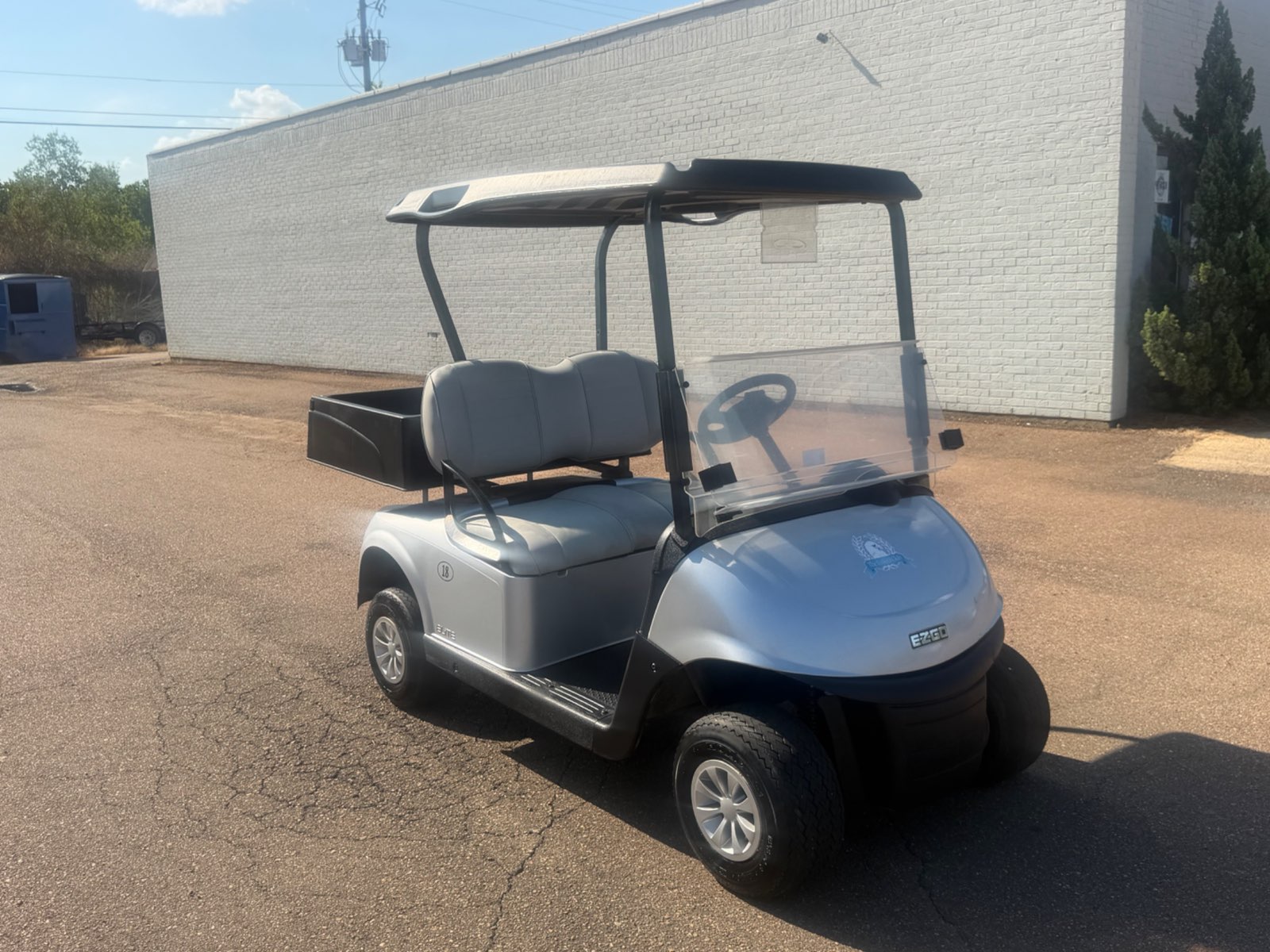 2021 E-Z-GO RXV Elite Electric Golf Cart - Silver with Utility Bed - Samsung Lithium Battery - front angle - Jane's Golf Carts Pearl MS