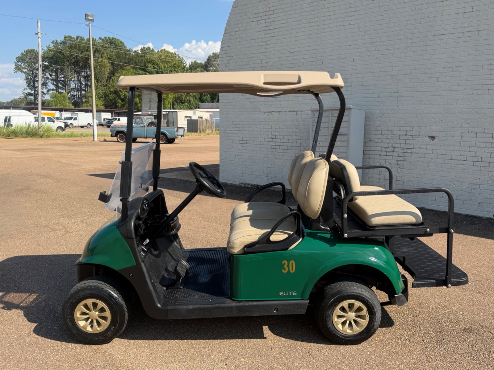 2021 E-Z-GO RXV Elite 4-Passenger Electric Golf Cart - Green - Samsung Lithium Battery - side, driver side - Jane's Golf Carts Pearl MS