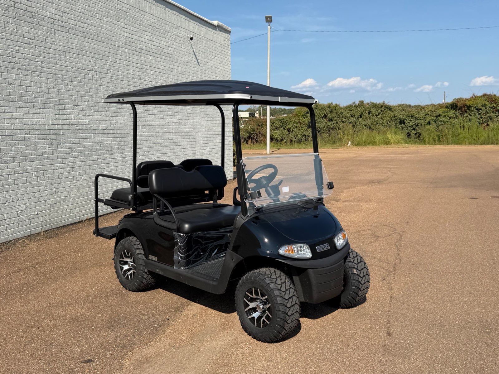 2026 E-Z-GO RXV Elite 4-Passenger Electric Golf Cart - Black - Certified Pre-Owned - Samsung Lithium Battery - front angle - Jane's Golf Carts Pearl MS