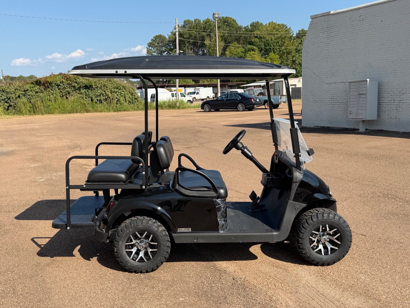 2026 E-Z-GO RXV Elite 4-Passenger Electric Golf Cart - Black - Certified Pre-Owned - Samsung Lithium Battery - side - Jane's Golf Carts Pearl MS