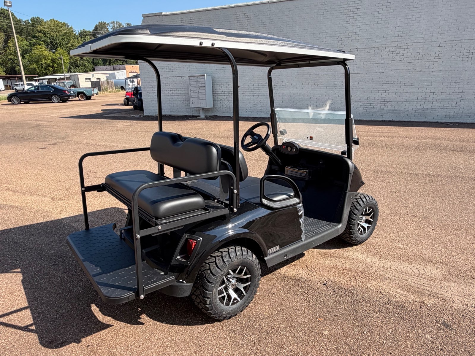 2026 E-Z-GO RXV Elite 4-Passenger Electric Golf Cart - Black - Certified Pre-Owned - Samsung Lithium Battery - rear angle - Jane's Golf Carts Pearl MS