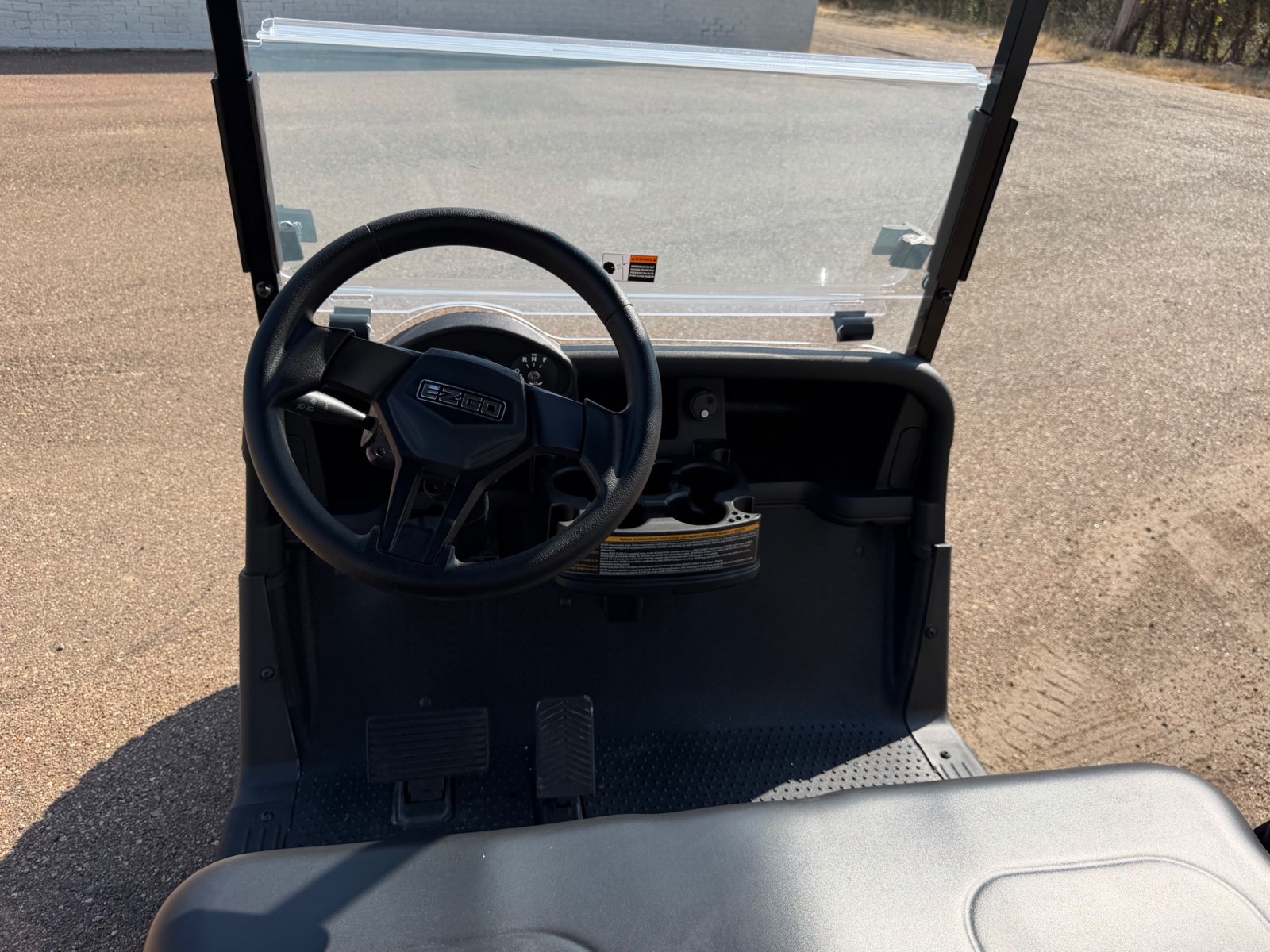 2026 E-Z-GO RXV Elite 4-Passenger Electric Golf Cart - Black - Certified Pre-Owned - Samsung Lithium Battery - steering wheel and dash - Jane's Golf Carts Pearl MS