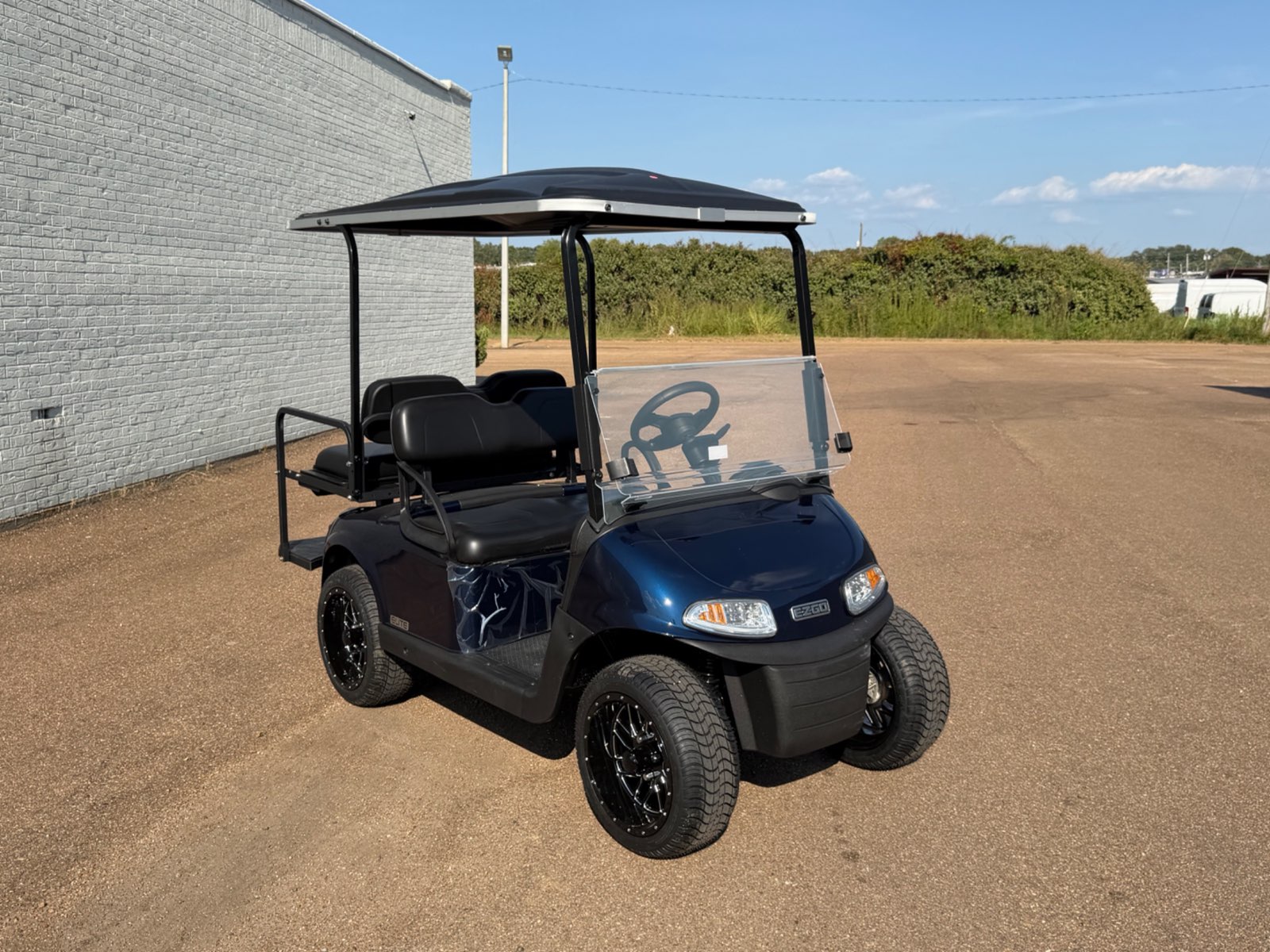 2026 E-Z-GO RXV Elite 4-Passenger Electric Golf Cart - Blue - Certified Pre-Owned - Samsung Lithium Battery - front angle - Jane's Golf Carts Pearl MS