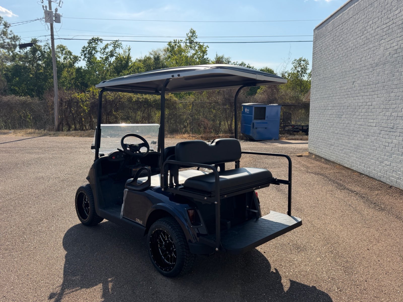 2026 E-Z-GO RXV Elite 4-Passenger Electric Golf Cart - Blue - Certified Pre-Owned - Samsung Lithium Battery - rear angle, driver side - Jane's Golf Carts Pearl MS