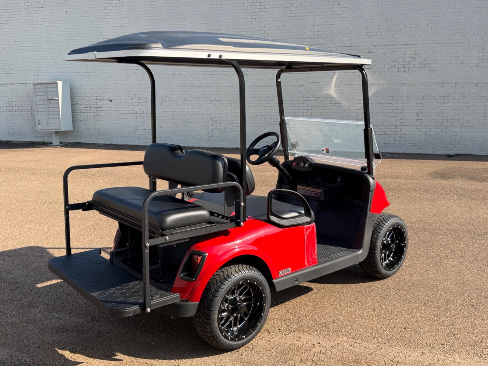 2026 E-Z-GO RXV Elite 4-Passenger Electric Golf Cart - Red - Certified Pre-Owned - Samsung Lithium Battery - rear angle - Jane's Golf Carts Pearl MS