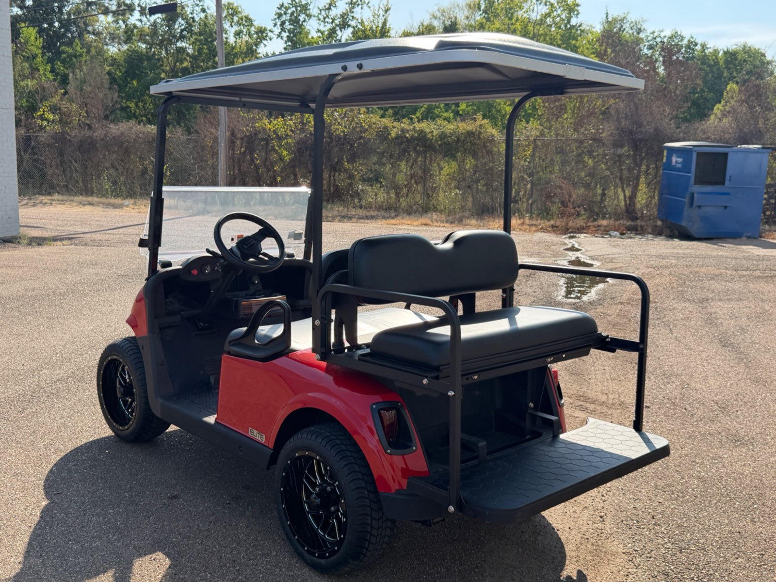 2026 E-Z-GO RXV Elite 4-Passenger Electric Golf Cart - Red - Certified Pre-Owned - Samsung Lithium Battery - rear angle, driver side - Jane's Golf Carts Pearl MS
