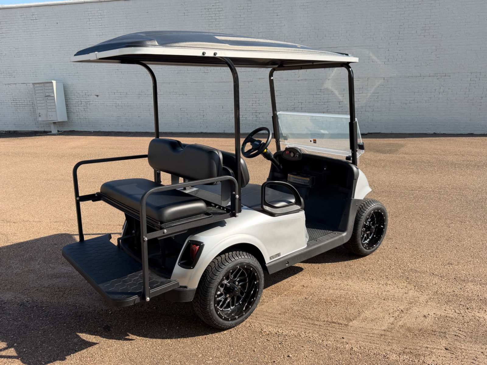 2026 E-Z-GO RXV Elite 4-Passenger Electric Golf Cart - Silver - Certified Pre-Owned - Samsung Lithium Battery - rear angle - Jane's Golf Carts Pearl MS
