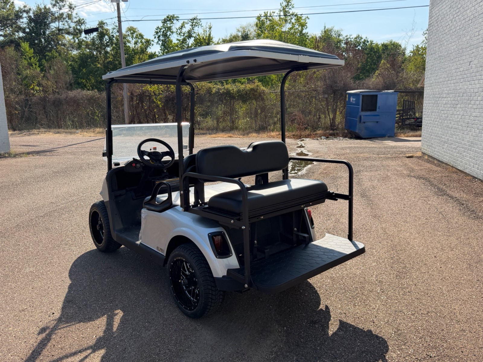 2026 E-Z-GO RXV Elite 4-Passenger Electric Golf Cart - Silver - Certified Pre-Owned - Samsung Lithium Battery - rear angle, driver side - Jane's Golf Carts Pearl MS