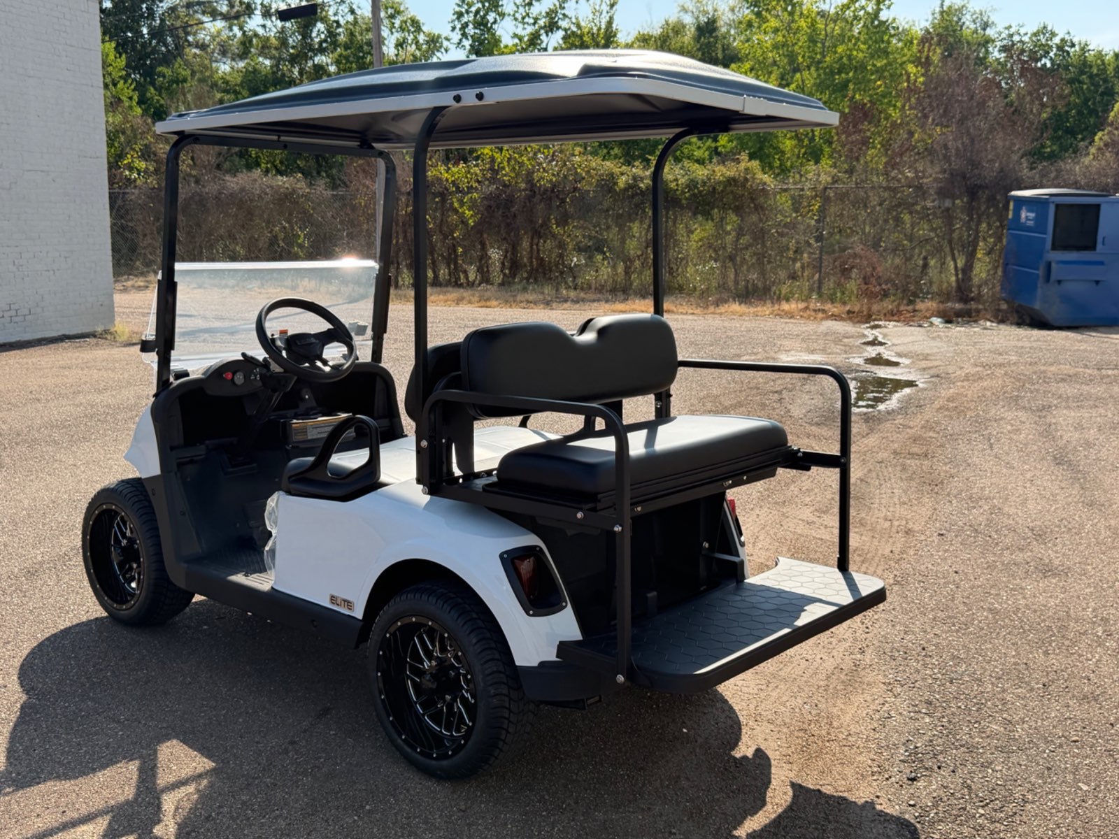2026 E-Z-GO RXV Elite 4-Passenger Electric Golf Cart - White - Certified Pre-Owned - Samsung Lithium Battery - rear angle, driver side - Jane's Golf Carts Pearl MS