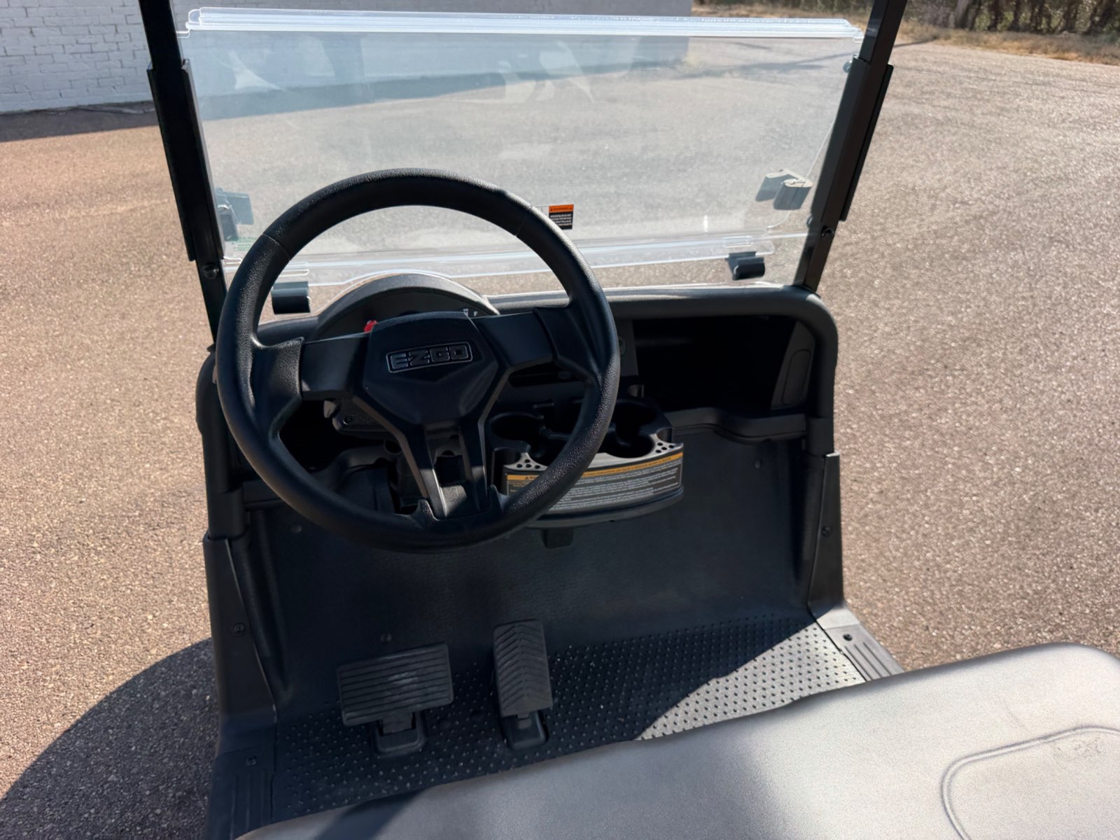 2026 E-Z-GO RXV Elite 4-Passenger Electric Golf Cart - White - Certified Pre-Owned - Samsung Lithium Battery - steering wheel and dash - Jane's Golf Carts Pearl MS